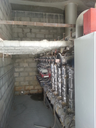 Hot water recirculating system in a hollow core factory at NCC, Bahrain