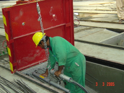Paul stressing jack being used in hollow core production at Nael Cement Products, Al Ain